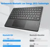 A keyboard with a touchpad is displayed on a white platform, with marketing text and feature comparisons below. Produktbild-Vorschau