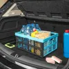 The image shows the interior of a car trunk, with a foldable storage box filled with items like water bottles and cleaning supplies. Produktbild-Vorschau