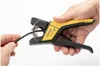 A person is using a yellow and black wire stripper tool on a black cable against a white background. Anteprima dell’immagine prodotto