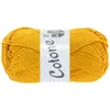 A ball of yellow yarn with a label. Produktbild-Vorschau