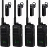 Four black walkie-talkies with attached Bluetooth headsets are arranged in a row against a white background. Produktbild-Vorschau