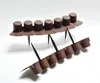 Two rows of brown plastic lawn edging spikes are shown against a white background. Produktbild-Vorschau