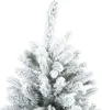 Close-up of the top of a snow-covered artificial Christmas tree. Náhled obrázku produktu