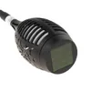 A close-up shot of a black solar-powered garden torch light. Voir les images du produit