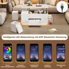 A modern living room scene featuring a white lift-top coffee table with integrated LED lighting and storage, accompanied by a smartphone displaying app controls for the lighting. Náhled obrázku produktu