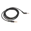 A black audio cable coiled on a white background. Náhled obrázku produktu