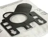 A close-up of a black vacuum cleaner bag adapter on a white vacuum cleaner bag. Produktbild-Vorschau