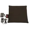 A black heating pad and its accessories are laid out on a white background. Produktbild-Vorschau