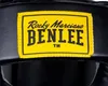 A close-up of a yellow label with black text on a black product. Anteprima dell’immagine prodotto