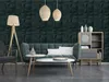 A living room scene with a sofa, coffee table, and a shelf unit against a textured wall. Produktbild-Vorschau