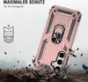 A rose gold phone case with a ring holder is shown in a dynamic, action-oriented scene, with debris flying around it, suggesting durability and protection. Produktbild-Vorschau