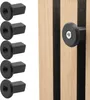 A group of black hooks on a white background and one hook attached to a wooden panel. Produktbild-Vorschau