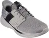 A single Skechers Slade - Caster men's half shoe is shown against a white background. Voir les images du produit