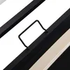 A close-up view of a bed frame with a metal handle attached to a black slat. Produktbild-Vorschau