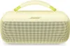 A yellow Bose SoundLink Max portable Bluetooth speaker with a green accent on the handle. Produktbild-Vorschau