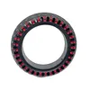 A black tire with red accents, shown from the side against a white background. Produktbild-Vorschau