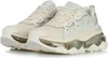A pair of white Skechers sneakers is displayed against a white background. Anteprima dell’immagine prodotto