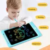 A young child is drawing on a blue LED writing tablet. Podgląd zdjęcia produktu