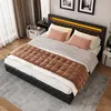 A bedroom scene featuring a bed with LED lighting. Produktbild-Vorschau