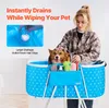 A woman is bathing a dog in a blue portable pet bathtub. There are product features highlighted with text and an inset image. Produktbild-Vorschau