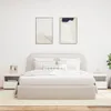 A bedroom scene with a bed and two nightstands. Produktbild-Vorschau
