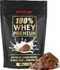 A bag of Activlab 100% Whey Premium protein powder with a chocolate bar and milk splash illustration. Produktbild-Vorschau