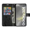 A black wallet-style phone case for a Samsung Galaxy S24, open to show card slots and a bill compartment, with the phone screen visible. Produktbild-Vorschau