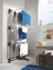 A multi-tiered drying rack with towels hanging on it, placed in a bathroom setting. Voir les images du produit