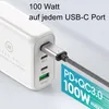 A close-up of a white USB-C charger plugged into a cable, with text overlays highlighting its features. Produktbild-Vorschau