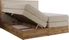 A boxspring bed with its storage compartment open, revealing the internal mechanism and storage space. Produktbild-Vorschau