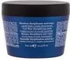 A blue jar of hair mask with text on it, set against a white background. Náhled obrázku produktu