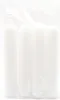 Four white candles are packaged together in clear plastic. Produktbild-Vorschau