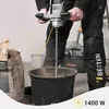 A person is using an electric mixer to mix materials in a bucket. Náhled obrázku produktu