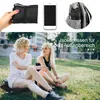 Collage showing a folded outdoor seat cushion, a smartphone, a cushion in a backpack, and two women sitting on grass. Produktbild-Vorschau