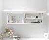 A white wall-mounted cabinet with its doors open, displaying various bathroom products and towels. Produktbild-Vorschau