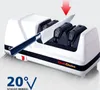 A white electric knife sharpener with a knife being sharpened. Produktbild-Vorschau