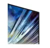 A close-up view of the corner of a Samsung QLED Smart TV, showing the textured bezel and a vibrant, abstract display. Produktbild-Vorschau