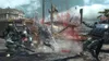 A violent battle scene with characters in futuristic armor fighting with swords and clubs, with blood splattering. Produktbild-Vorschau