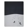 Two skiers on a snowy slope under a dark sky. Produktbild-Vorschau