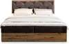 A bed with a tufted headboard and wooden base, set against a white background. Produktbild-Vorschau