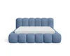A blue upholstered bed frame with a white mattress on a white background. Voir les images du produit