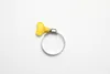 A single hose clamp with a yellow handle is shown against a white background. Produktbild-Vorschau