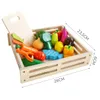 A wooden crate filled with toy fruits and vegetables, with dimensions indicated. Náhled obrázku produktu