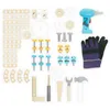 A collection of wooden and plastic toy construction pieces, tools, and gloves laid out on a white background. Produktbild-Vorschau