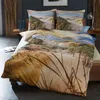 A bed with a duvet cover and pillows featuring a beach dune scene. Produktbild-Vorschau