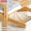 Close-up of a bamboo laundry sorter with folded towels on the top shelf and fabric laundry bags below. Podgląd zdjęcia produktu
