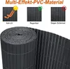 A rolled-up privacy screen with marketing graphics above. Produktbild-Vorschau