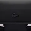 A close-up of a black bag with a crocodile logo. Anteprima dell’immagine prodotto