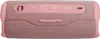A close-up view of the top panel of a pink JBL Flip 6 portable speaker. Voir les images du produit