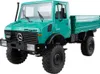 A green Mercedes-Benz Unimog truck is shown from a three-quarter front view against a white background. Anteprima dell’immagine prodotto